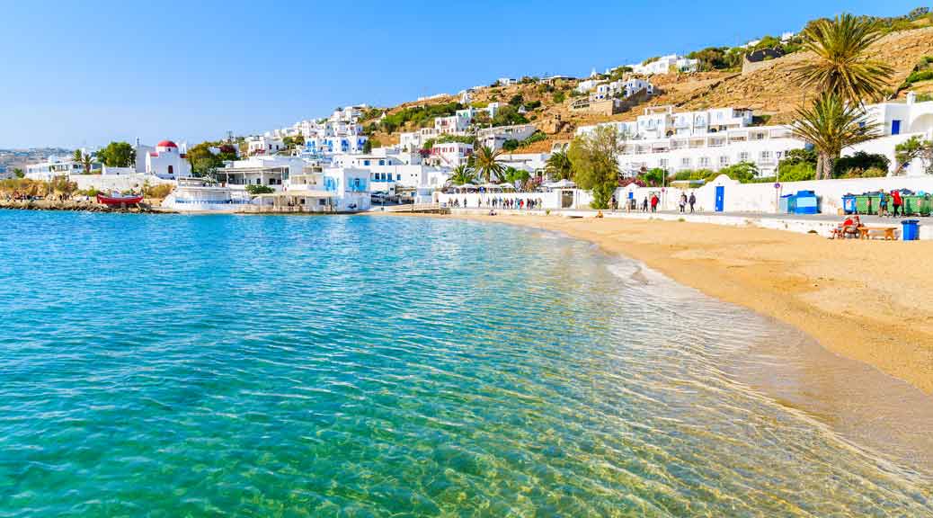 Beautiful beach with crystal clear sea water in Mykonos town, Cyclades, Greece