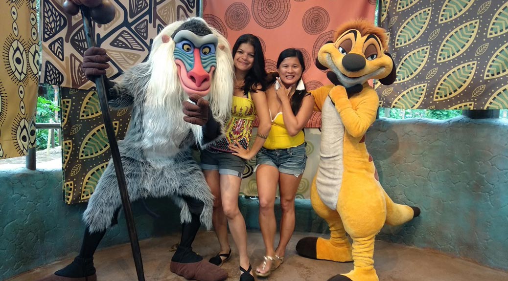 Girls with Timon and Pumba characters at Disneyland, Hong Kong