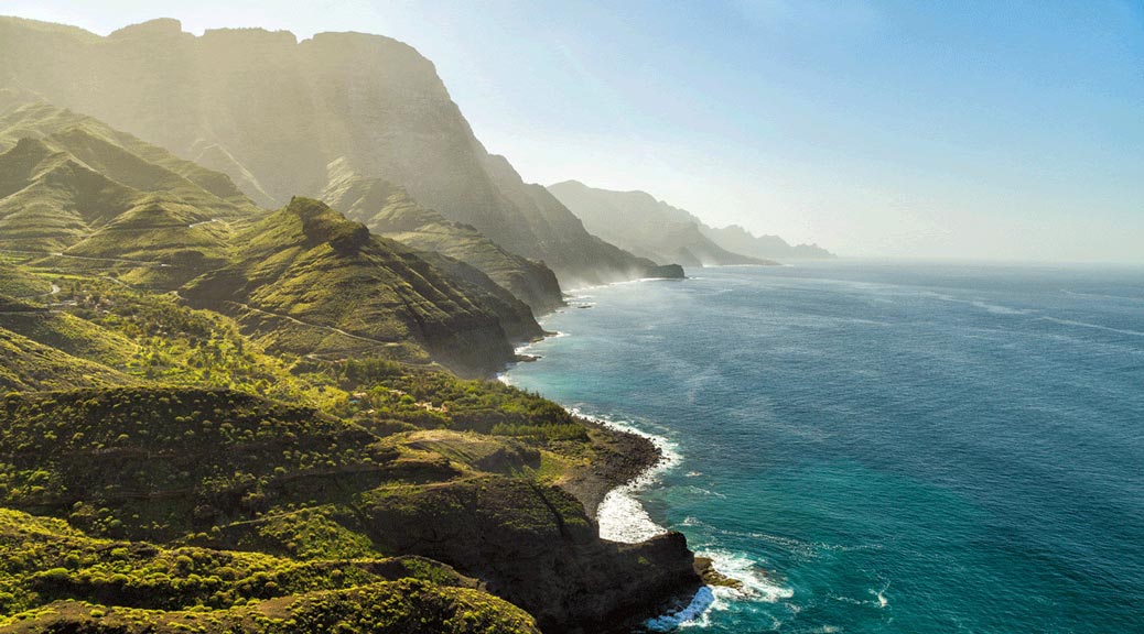 Green hills and cliffs of Tamadaba Natural Park on the coast of the ocean near Agaete, Gran Canaria island