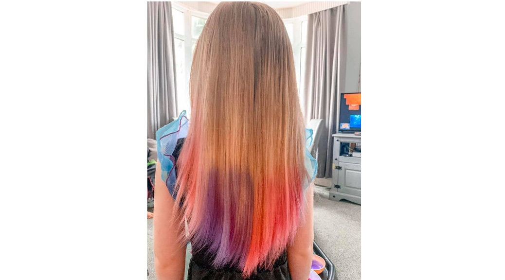 A girl Showing her coloured hair