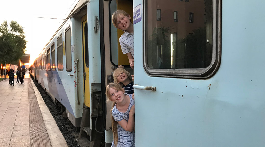 A Blogger with her kids in Train, morocco