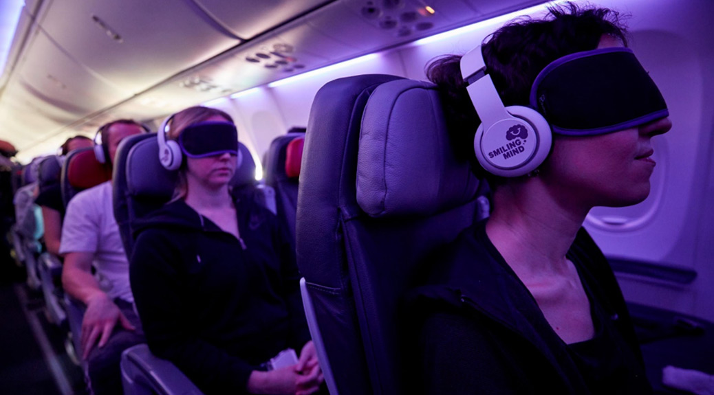 People with headphone at a plane
