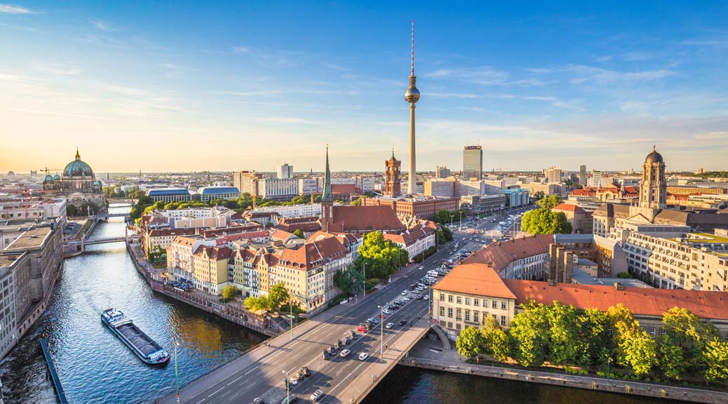 Panorama view of Berlin skyline with TV tower and Spree river at sunset, Berlin, Germany
