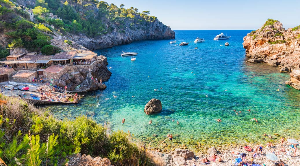 beautiful beach of Cala Deia, Majorca island, Mediterranean Sea.