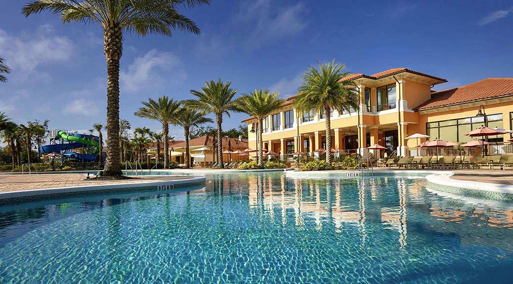 swimming pool and palm trees at encantada resort orlando florida usa