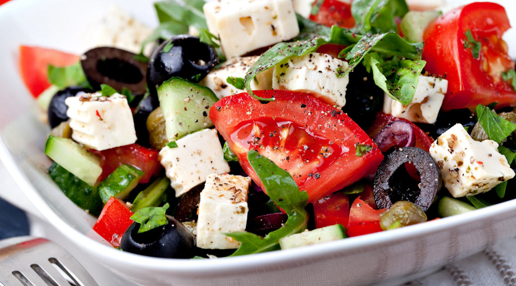 vegetable salad with feta cheese, tomatoes and olives