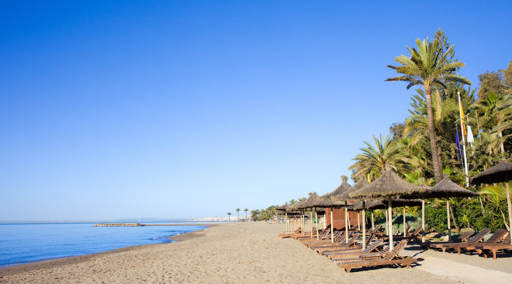 Sun Loungers on a Sandy Beach in Marbella