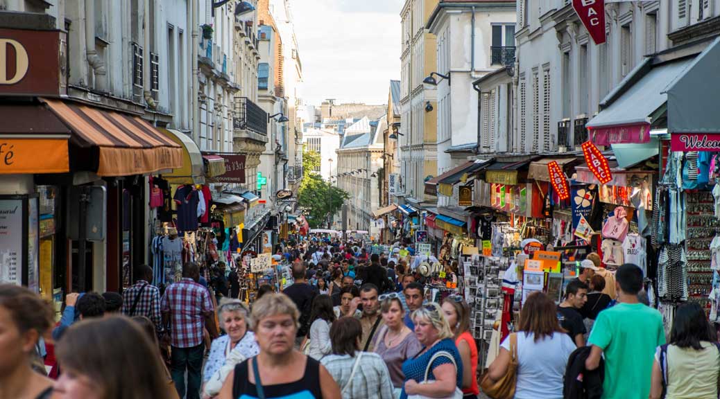 tourists enjoying shopping in paris markets
