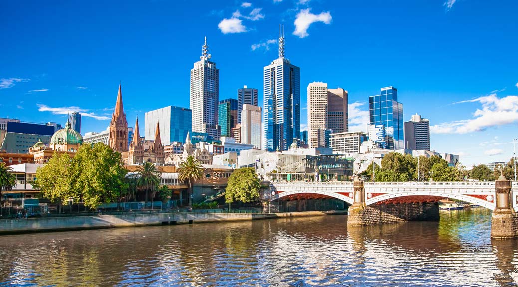Melbourne skyline and Flinders Street Station seen from Princess Bridge over Yarra river Australia