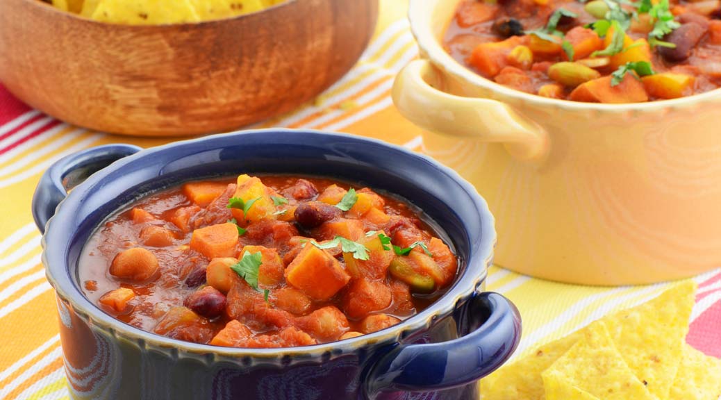  vegan mexican sweet potato bean & chickpea chilli served on a bowl