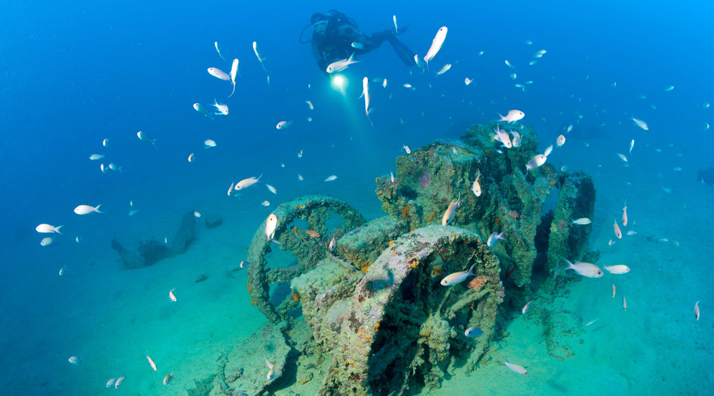 Scuba diver at Taranto Wreck underwater museum