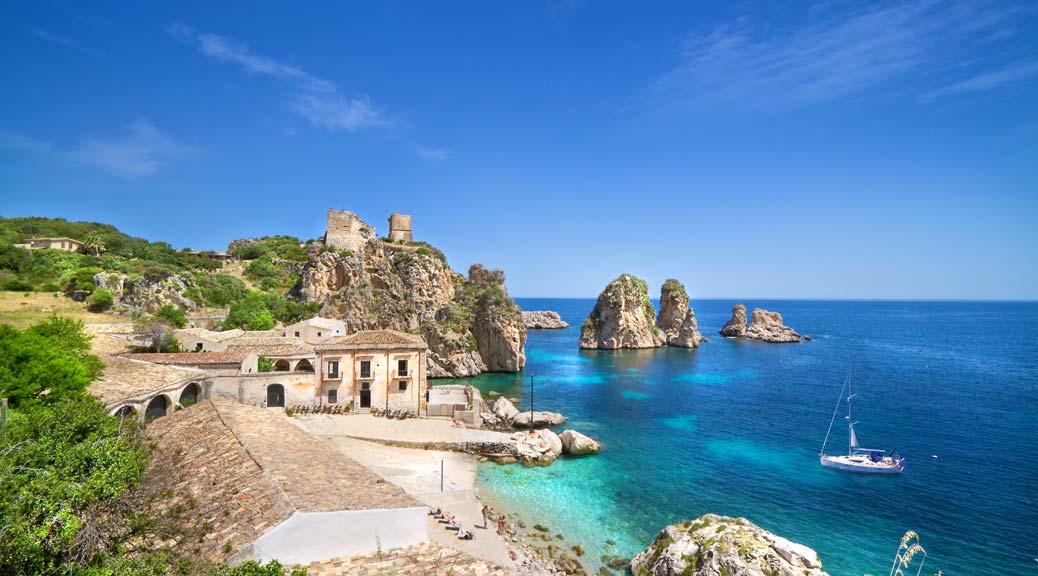 gorgeous sunny day with torquise water and beach in Tonnara di scopello sicily Italy