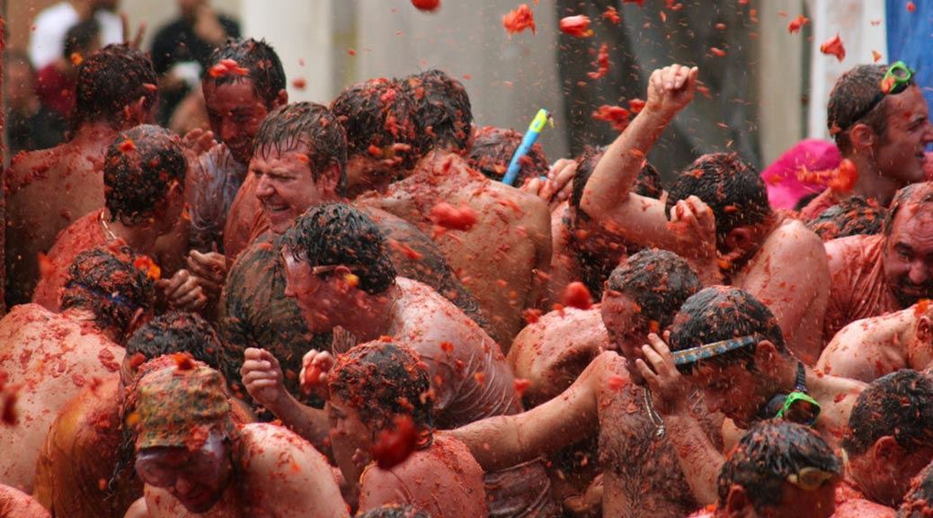 people enjoying at La Tomatina festival spain