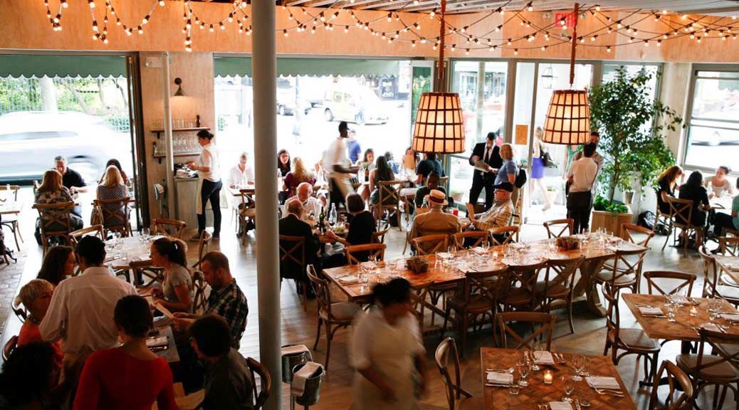 people enjoying food in rosemary restaurent in new york