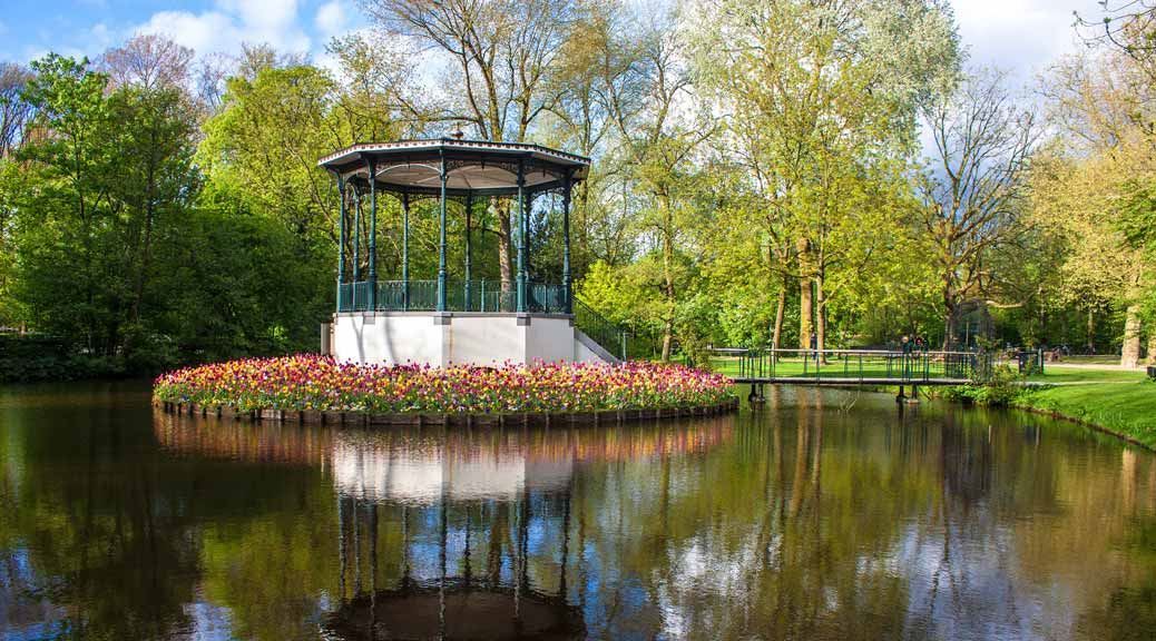 off te beaten track pond tulips vondelpark amsterdam netherland