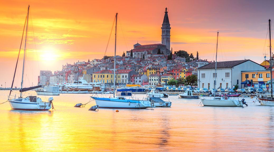 Stunning sunset in a fishing harbor, Istria